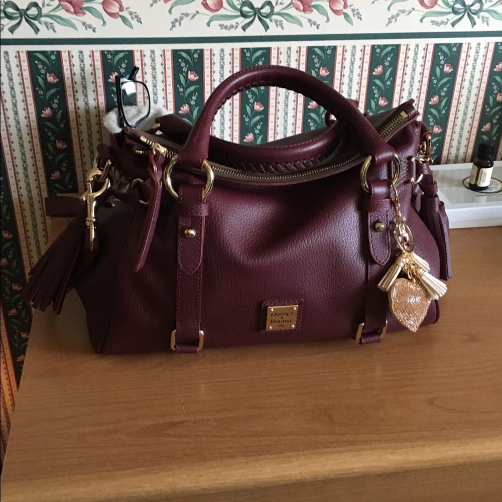 Dooney and Bourke in rare color Bordeaux. EUC, carried once. Moving must sell😢